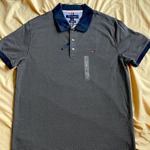 Mens large Tommy Hilfiger polo shirt in navy blue color.